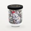 Smelty Christmas candle in a white ceramic jar with a black wooden lid and gold Smelty logo, printed with a sleepy koala in a Santa hat hugging the trunk inside a Christmas tree decorated with pine cones and baubles.
