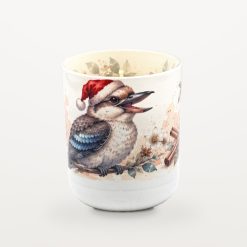 Kookaburra Cinnamon Orange candle with the lid off, showing the candle inside and watercolour eucalyptus leaves printed around the inside rim of the jar.